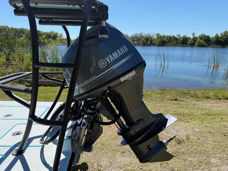 Slide: The Image of 2025 Maverick HPX 17 HPX-S boat with Yamaha outboard motor by a lake. - 22