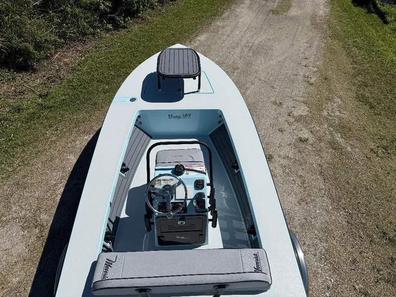 Slide: The Image of 2025 Maverick HPX 17 HPX-S boat on a grassy path, top view. - 4