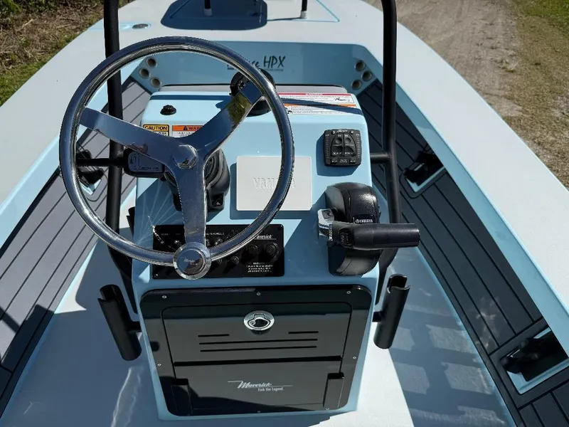 Slide: The Image of 2025 Maverick HPX 17 HPX-S boat console with steering wheel and controls. - 5