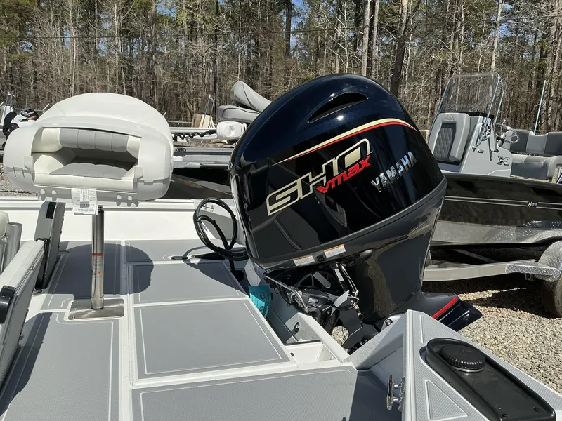 Slide: The Image of 2025 G3 Bay 20 boat with Yamaha SHO VMAX outboard motor in a wooded area. - 13