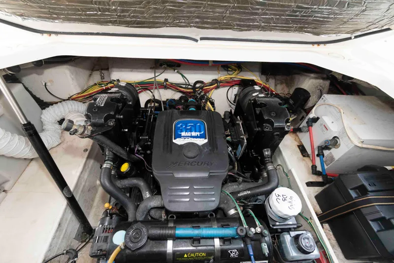 Slide: The Image of Engine compartment of a 2008 Bayliner 285 boat with Mercury 350 MAG MPI engine. - 18