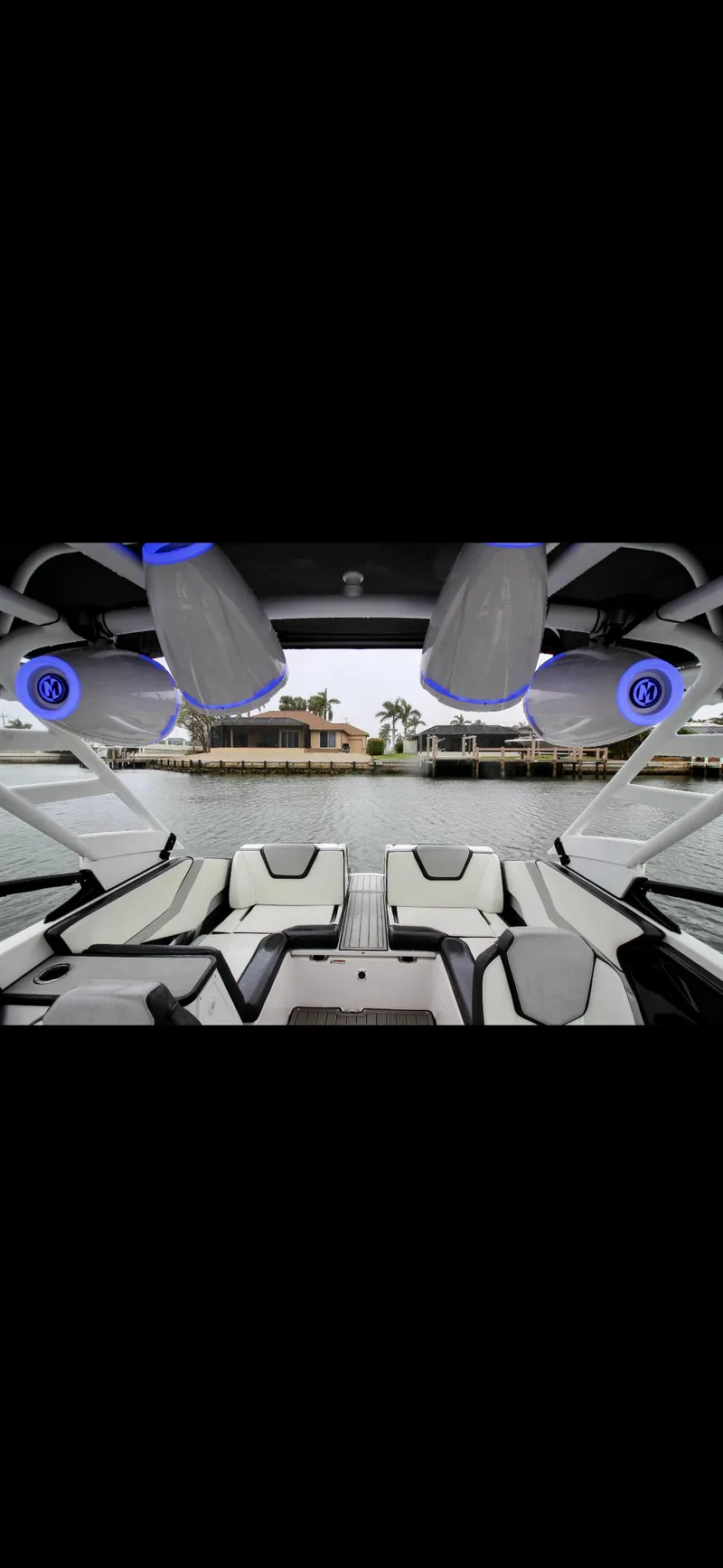 Slide: The Image of 2023 Yamaha Boats 252SD interior with modern seating and advanced audio system. - 14