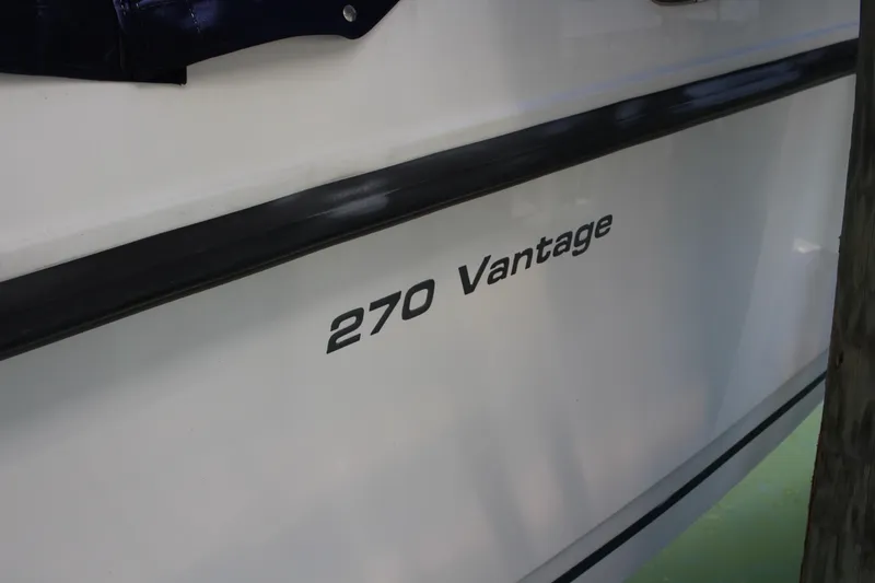 Slide: The Image of Boston Whaler 270 Vantage boat, 2014 model, side view with name visible. - 19