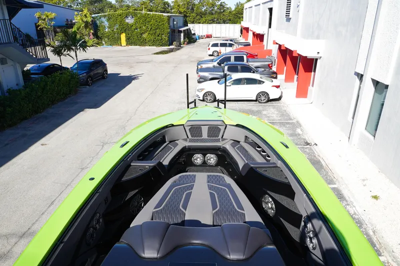 Slide: The Image of 2022 MTI 50V Center Console boat in a parking lot, top view. - 14