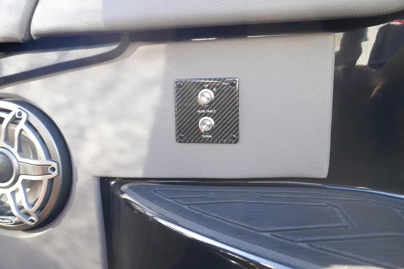 Slide: The Image of 2022 MTI 50V Center Console interior with speaker and control panel. - 18