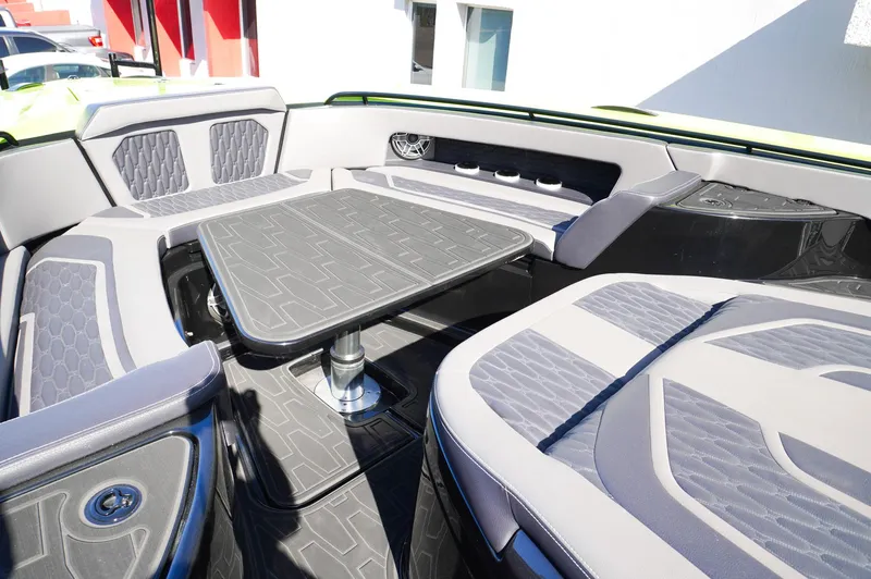 Slide: The Image of Luxurious seating area on a 2022 MTI 50V Center Console boat. - 19