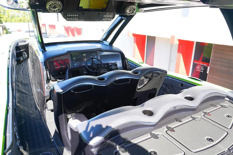 Slide: The Image of 2022 MTI 50V Center Console interior with modern dashboard and seating. - 23