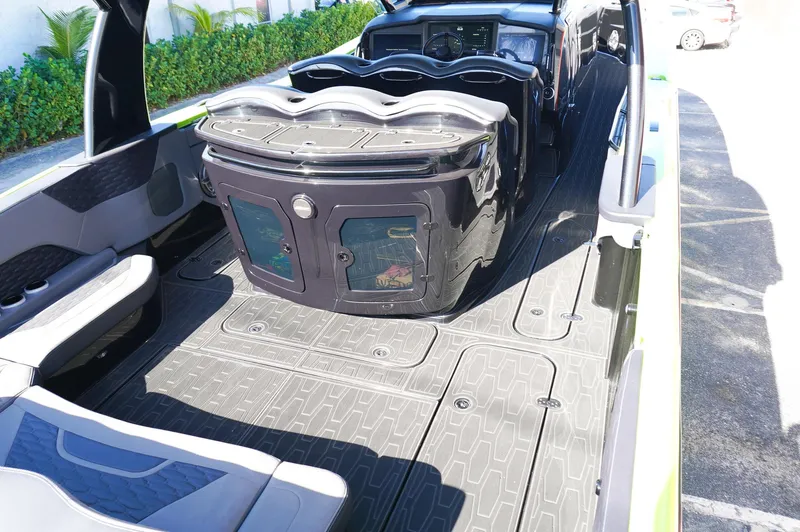 Slide: The Image of 2022 MTI 50V Center Console boat interior with seating and storage compartments. - 24