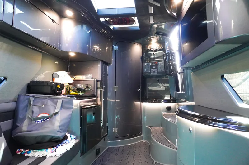 Slide: The Image of Luxurious interior of a 2022 MTI 50V Center Console boat with modern amenities. - 27