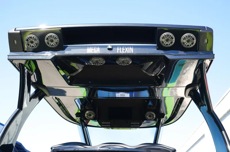 Slide: The Image of 2022 MTI 50V Center Console boat with advanced audio system and sleek design. - 39