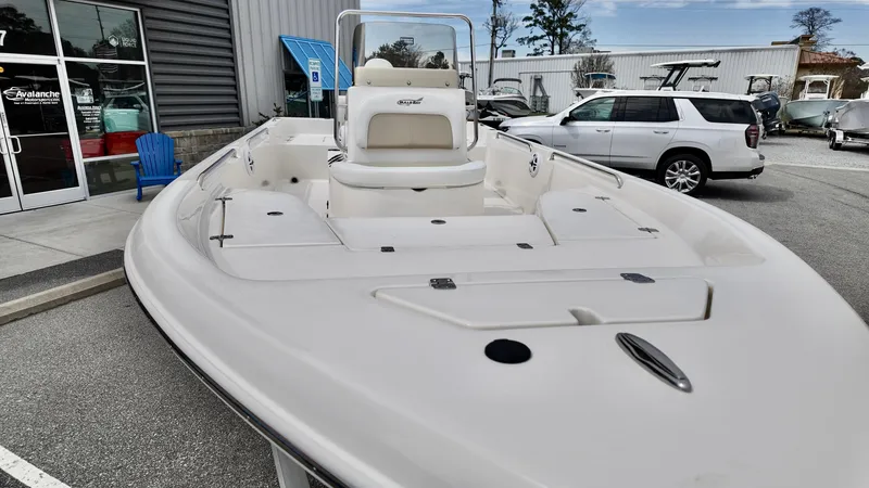 Slide: The Image of 2025 Bulls Bay 2000 boat displayed outdoors, showcasing sleek design and spacious deck. - 6