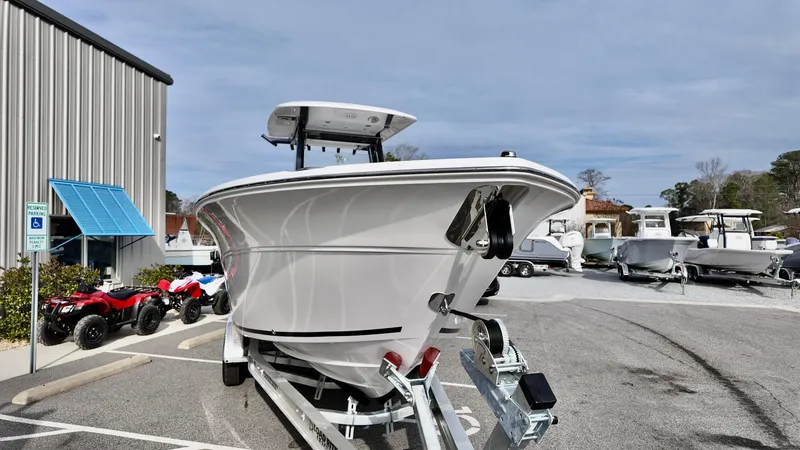 Slide: The Image of 2025 Sea Fox 268 Commander boat on trailer in parking lot. - 5