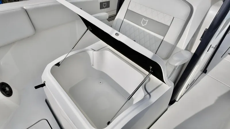 Slide: The Image of 2025 Sea Fox 268 Commander boat interior with open storage compartment. - 9