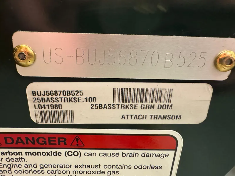 Slide: The Image of 2025 Tracker Bass Tracker Classic Limited identification and warning labels on transom. - 4