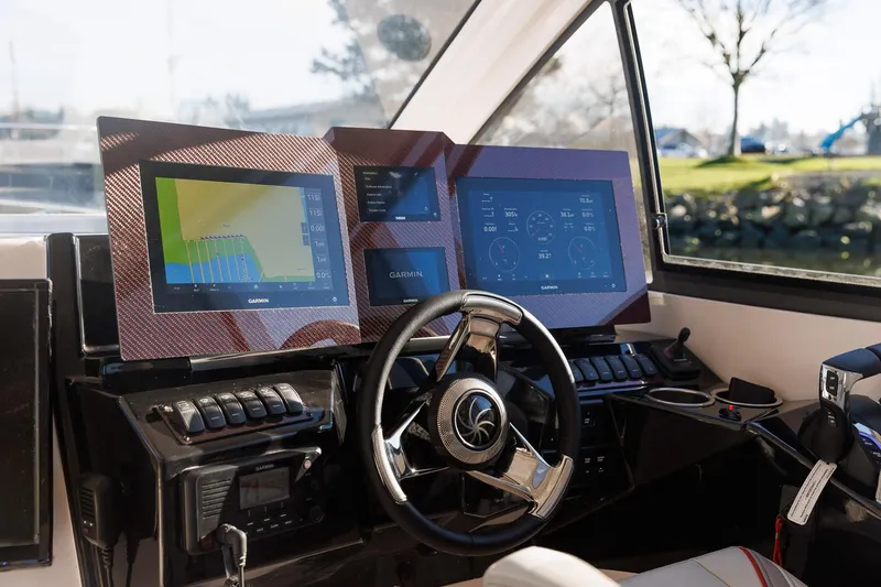 Slide: The Image of Helm of 2026 Solara S-310 Sport Bridge with advanced navigation displays. - 14