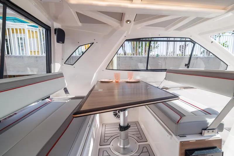 Slide: The Image of Interior of 2026 Solara S-310 Sport Bridge with dining area and modern seating. - 18