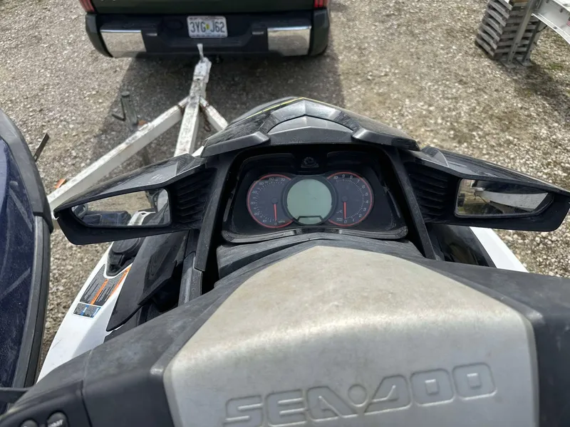Slide: The Image of 2015 Sea-Doo Wake Pro 215 dashboard view with trailer in background. - 4