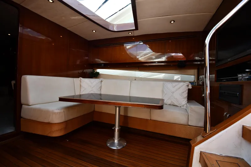 Slide: The Image of Luxurious interior of 2008 Savannah 54 EXPRESS yacht with elegant seating and wooden finishes. - 32