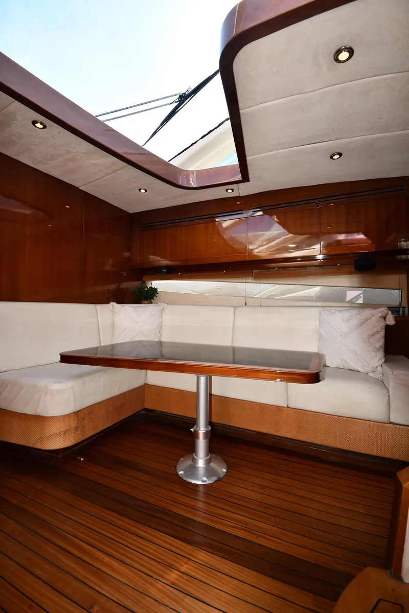 Slide: The Image of Luxurious interior of 2008 Savannah 54 EXPRESS yacht with elegant wood and white seating. - 33