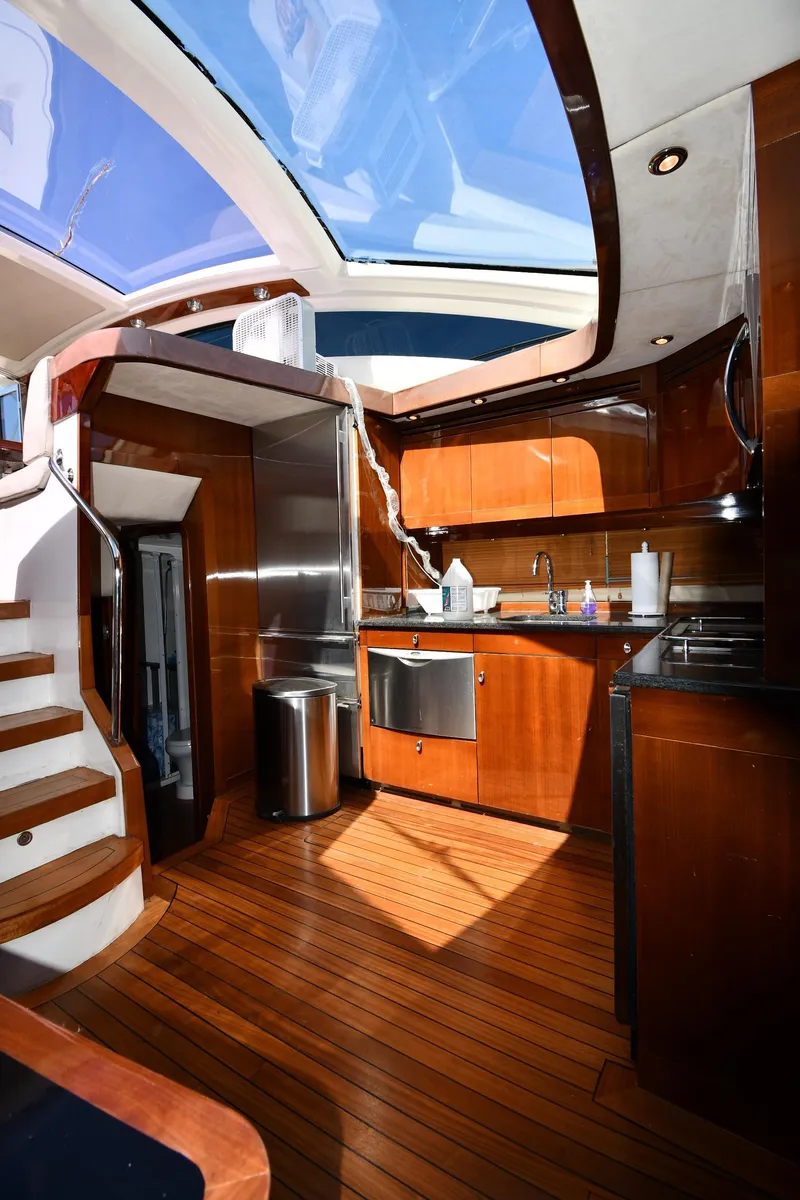 Slide: The Image of Luxurious interior of 2008 Savannah 54 EXPRESS yacht with wooden flooring and modern kitchen. - 37