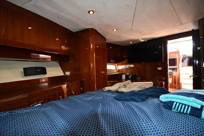 Slide: The Image of Luxurious cabin interior of 2008 Savannah 54 EXPRESS yacht with wood finishes and modern amenities. - 49