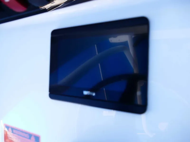 Slide: The Image of 2021 Sea Hunt Gamefish 27 console display, featuring a sleek black screen. - 17