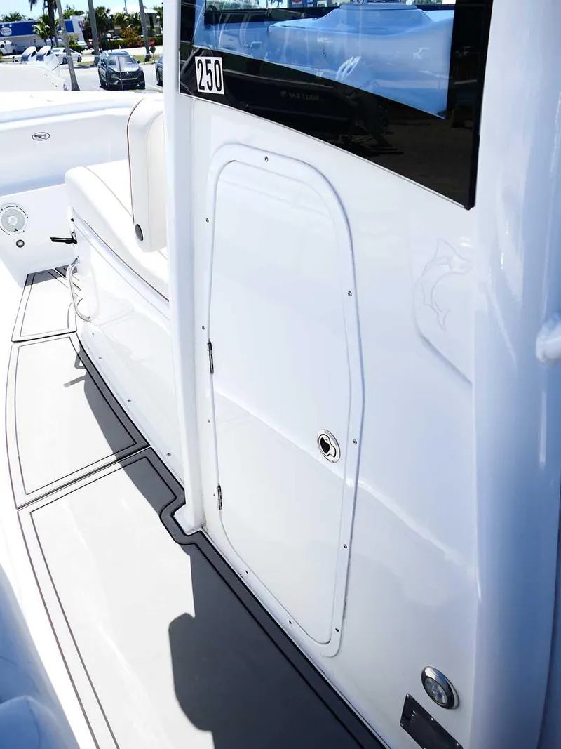 Slide: The Image of 2021 Sea Hunt Gamefish 27 boat interior, featuring a coffin box and sleek design. - 26