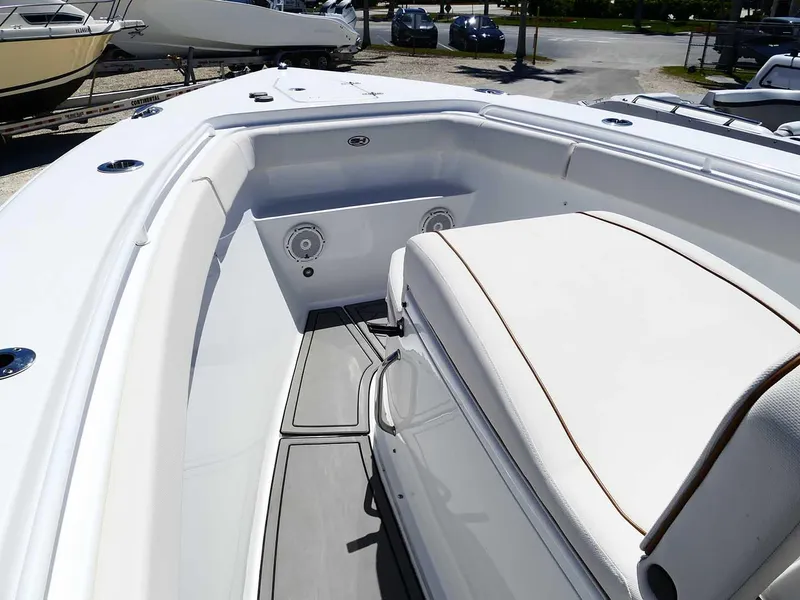 Slide: The Image of 2021 Sea Hunt Gamefish 27 with Coffin Box, featuring spacious seating and sleek design. - 30