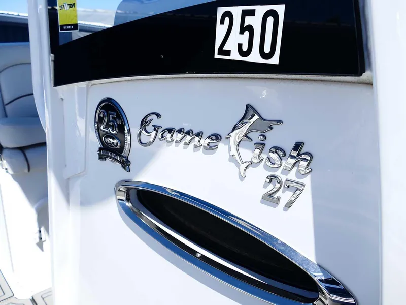 Slide: The Image of 2021 Sea Hunt Gamefish 27 boat emblem with 25th anniversary badge. - 38