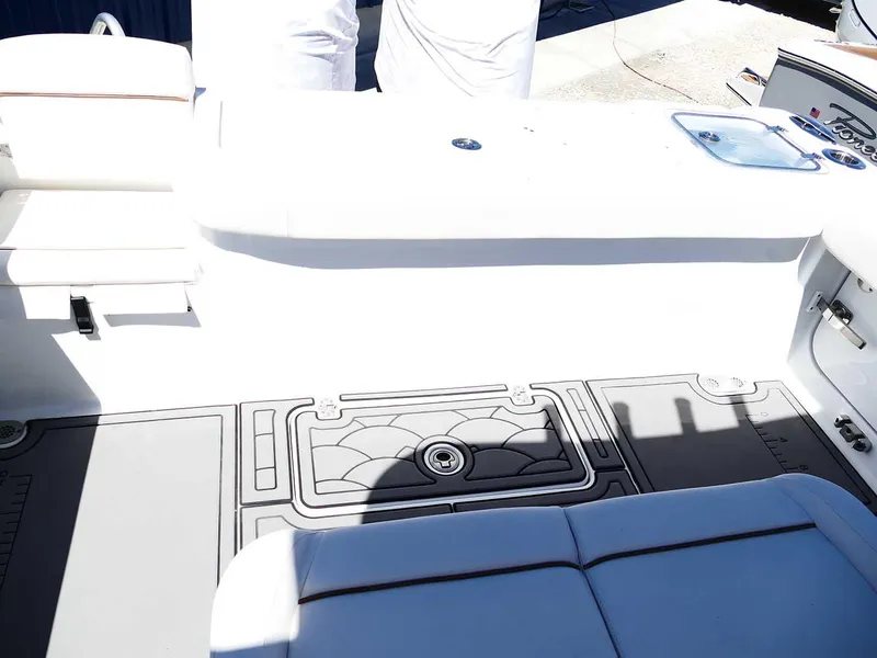 Slide: The Image of 2021 Sea Hunt Gamefish 27 interior with coffin box, featuring sleek seating and deck design. - 40