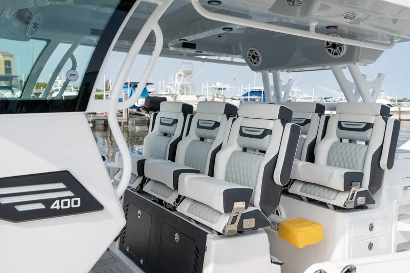 Slide: The Image of 2024 Blackfin 400 CC boat interior with luxurious seating and modern design. - 20