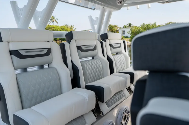 Slide: The Image of 2024 Blackfin 400 CC boat interior with luxurious seating and modern design. - 22