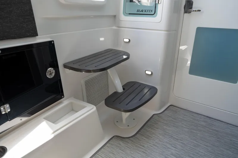 Slide: The Image of 2024 Blackfin 400 CC interior with sleek steps and modern design elements. - 38