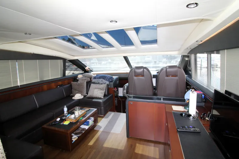 Slide: The Image of Luxurious interior of 2013 Princess V62 yacht with leather seating and modern amenities. - 29