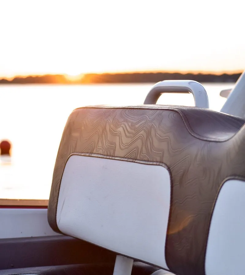 Slide: The Image of Highfield Velox 420 boat seat with sunset view, 2025 model. - 3