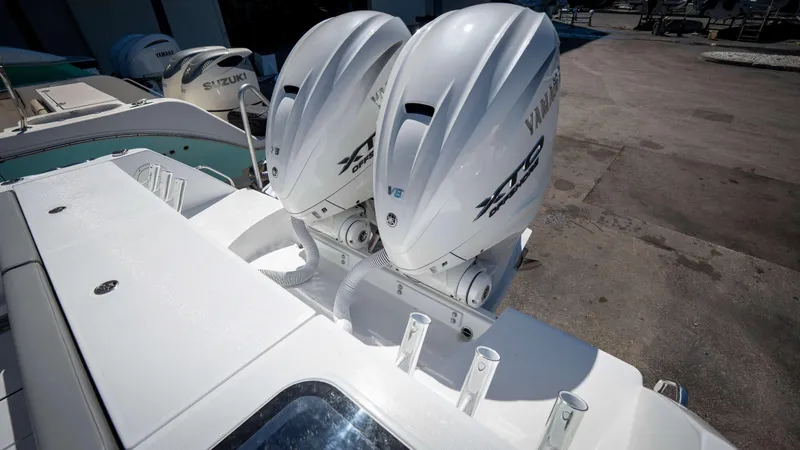 Slide: The Image of 2025 Everglades 335 CC boat with dual Yamaha outboard engines. - 39
