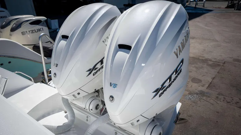 Slide: The Image of 2025 Everglades 335 CC boat with dual Yamaha XTO Offshore V8 engines. - 40
