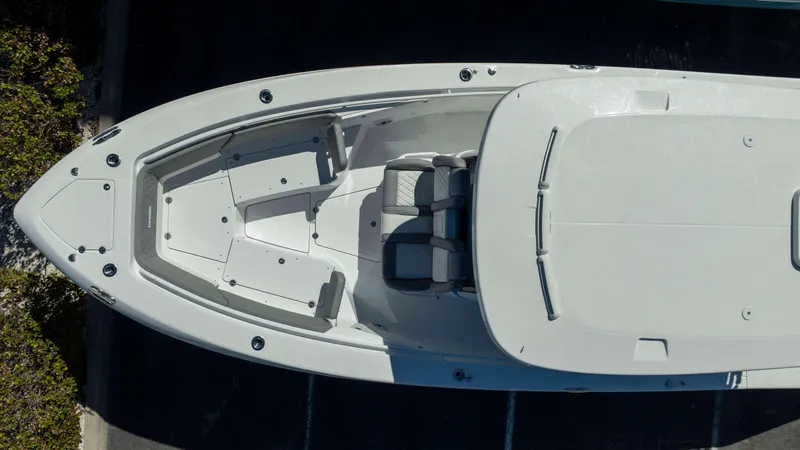 Slide: The Image of Overhead view of 2025 Everglades 335 CC boat, showcasing sleek design and spacious seating. - 7