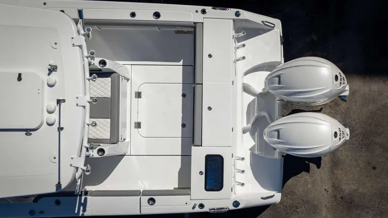 Slide: The Image of Overhead view of 2025 Everglades 335 CC boat with dual engines. - 8