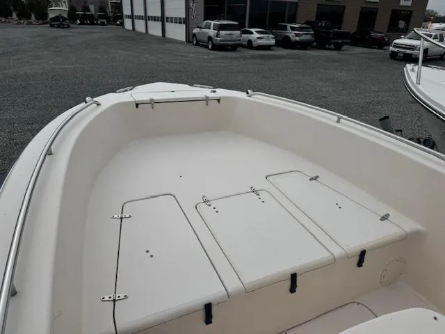 Slide: The Image of 2005 Grady-White Fisherman 222 boat deck, spacious and well-maintained, in a parking lot. - 4