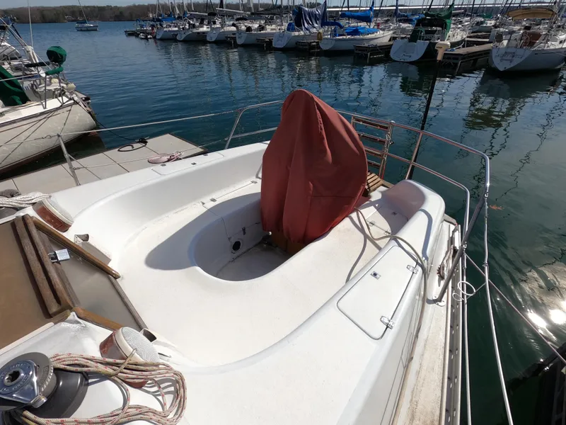 Slide: The Image of Sailboat deck view, Freedom 32 model, 1984, docked at marina. - 4