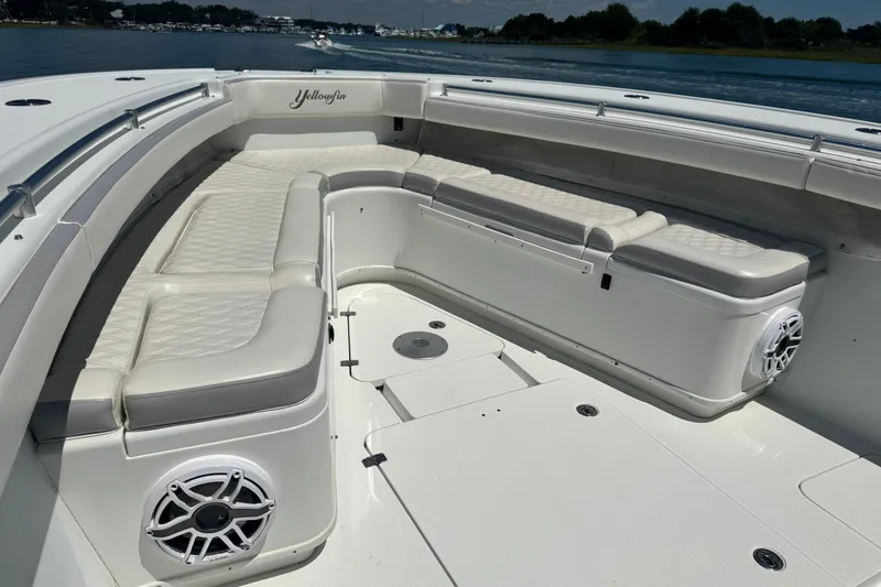 Slide: The Image of 2014 Yellowfin 42 Offshore boat with spacious seating and sleek design on the water. - 20