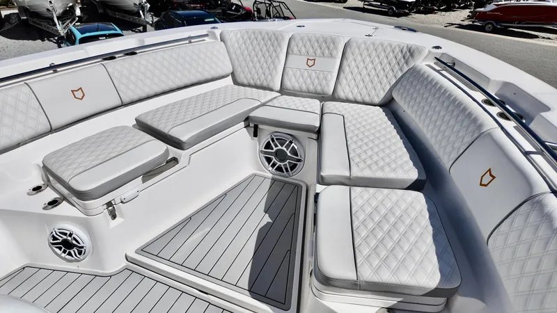 Slide: The Image of Luxurious seating area on 2025 Sea Fox 368 Commander boat with quilted upholstery. - 11