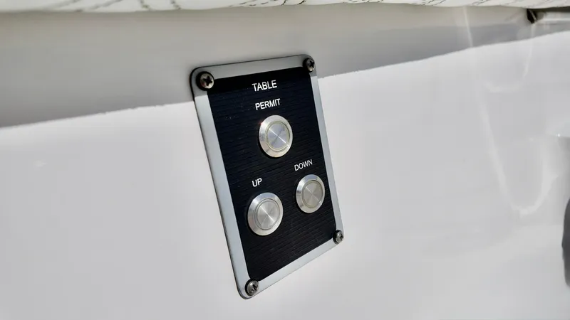 Slide: The Image of Control panel on 2025 Sea Fox 368 Commander boat for table adjustment. - 12