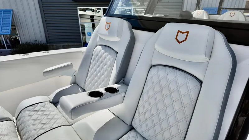Slide: The Image of Luxurious seating on 2025 Sea Fox 368 Commander boat with diamond-stitched upholstery. - 15