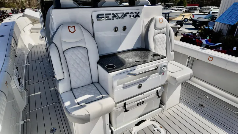 Slide: The Image of 2025 Sea Fox 368 Commander boat interior with luxury seating and storage. - 39