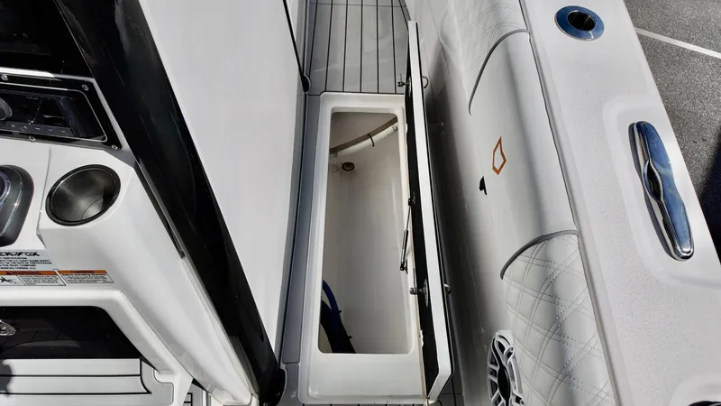 Slide: The Image of 2025 Sea Fox 368 Commander interior storage compartment with sleek design and modern features. - 42