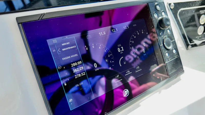 Slide: The Image of Dashboard of 2025 Sea Fox 368 Commander boat with digital display and controls. - 5