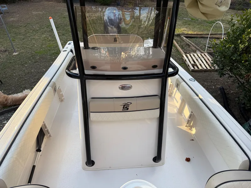 Slide: The Image of 2021 Carolina Skiff 23 Ultra Elite boat interior with console and seating. - 13