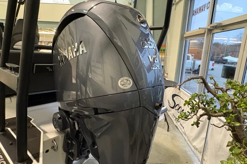 Slide: The Image of 2026 Highfield ADV7 with Yamaha 250 V6 outboard motor in showroom. - 4